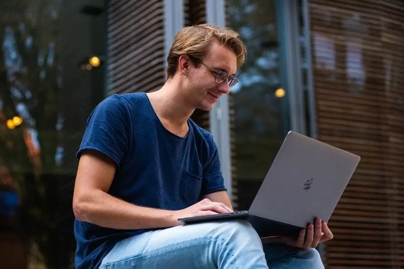 A student learning online with a laptop